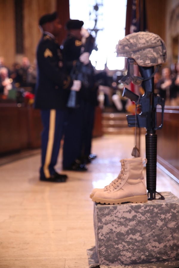 Members of the 321st Sustainment Brigade Color Guard, U.S. Army Reserves, present the American flag during a Memorial Day ceremony on the floor of the Louisiana House of Representatives at the state capitol in Baton Rouge, La., May 21, 2015. The House held a ceremony with Lt. Gen. Richard P. Mills, commander of Marine Forces Reserve, and senior leaders from other service branches in the local area to commemorate those who lost their lives in battle for the country.