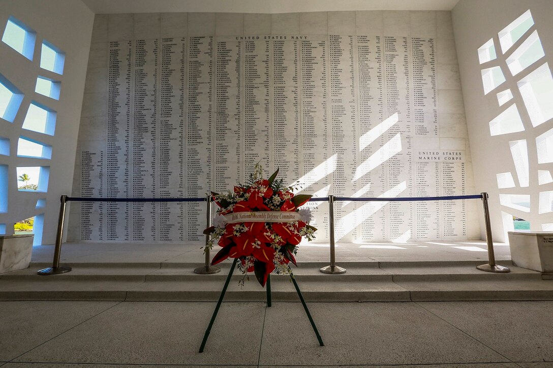 A wall of names stands in remembrance honoring the fallen veterans of the USS Arizona Memorial at Pearl Harbor in Honolulu, Hawaii, May 19, 2015. U.S. Marines with India Company, Battalion Landing Team 3rd Battalion, 1st Marine Regiment, 15th Marine Expeditionary Unit, took a moment to honor their predecessors in honor of Memorial day. (U.S. Marine Corps photo by Sgt. Jamean Berry/Released)
