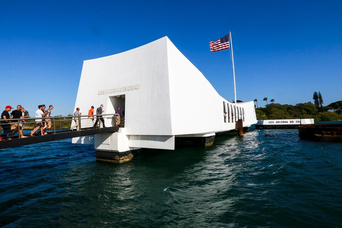 U.S. Marines with India Company, Battalion Landing Team 3rd Battalion, 1st Marine Regiment, 15th Marine Expeditionary Unit, visit the USS Arizona Memorial at Pearl Harbor in Honolulu, Hawaii, May 19, 2015. The Marines of BLT 3/1 took a moment to remember their predecessors in honor of Memorial Day. (U.S. Marine Corps photo by Sgt. Jamean Berry/Released)