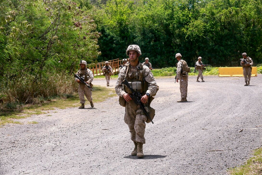 U.S. Marines with India Company, Battalion Landing Team 3rd Battalion, 1st Marine Regiment, 15th Marine Expeditionary Unit, patrol aboard Bellows Air Force Station, Hawaii, May 16, 2015. The Marines of BLT 3/1 used Hawaii’s unique environment and training areas to prepare for possible scenarios in their upcoming deployment. (U.S. Marine Corps photo by Sgt. Jamean Berry/Released)