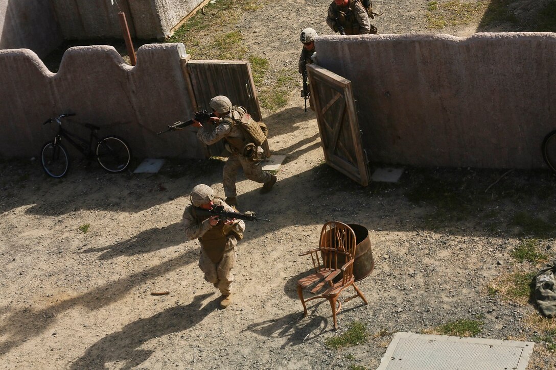 U.S. Marines with India Company, Battalion Landing Team 3rd Battalion, 1st Marine Regiment, 15th Marine Expeditionary Unit, patrol between objectives aboard Bellows Air Force Station, Hawaii, May 16, 2015. The Marines of BLT 3/1 used Hawaii’s unique environment and training areas to prepare for possible scenarios in their upcoming deployment. (U.S. Marine Corps photo by Sgt. Jamean Berry/Released)