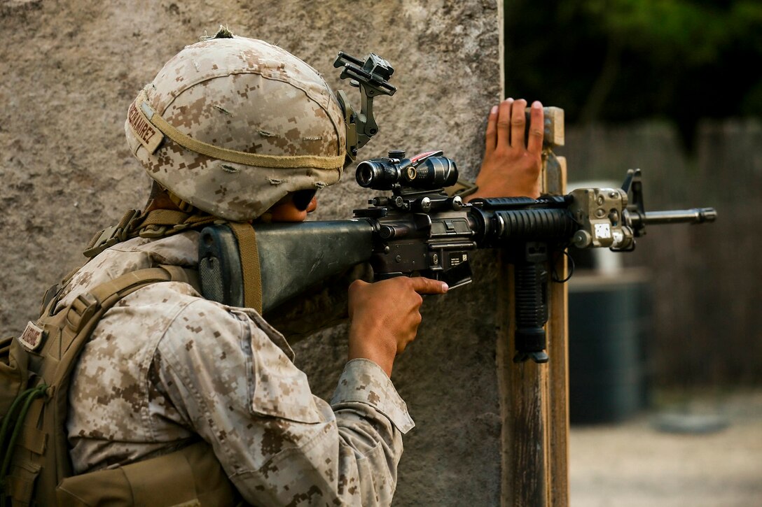 A U.S. Marine with India Company, Battalion Landing Team 3rd Battalion, 1st Marine Regiment, 15th Marine Expeditionary Unit, provides security aboard Bellows Air Force Station, Hawaii, May 16, 2015. The Marines of BLT 3/1 used Hawaii’s unique environment and training areas to prepare for possible scenarios in their upcoming deployment. (U.S. Marine Corps photo by Sgt. Jamean Berry/Released)