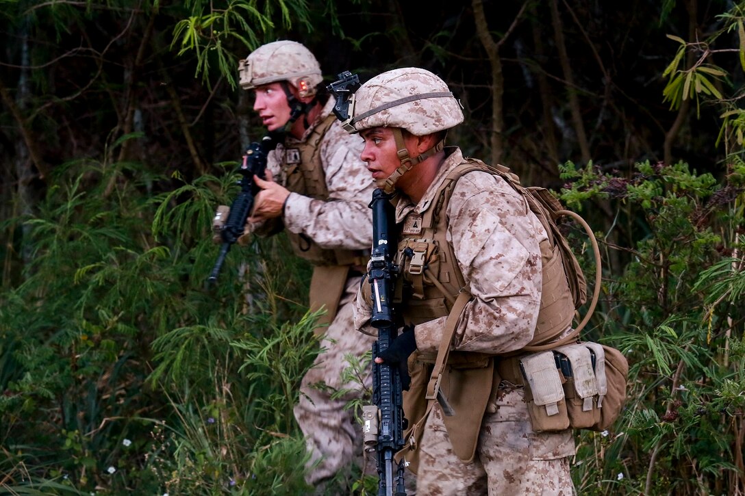 U.S. Marines with India Company, Battalion Landing Team 3rd Battalion, 1st Marine Regiment, 15th Marine Expeditionary Unit, move to their next objective aboard Bellows Air Force Station, Hawaii, May 16, 2015. The Marines of BLT 3/1 used Hawaii’s unique environment and training areas to prepare for possible scenarios in their upcoming deployment. (U.S. Marine Corps photo by Sgt. Jamean Berry/Released)