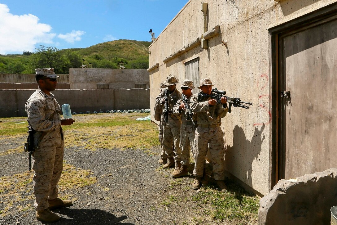 U.S. Marines with India Company, Battalion Landing Team 3rd Battalion, 1st Marine Regiment, 15th Marine Expeditionary Unit, practice room clearing techniques aboard Bellows Air Force Station, Hawaii, May 15, 2015. The Marines of BLT 3/1 used Hawaii’s unique environment and training areas to prepare for possible scenarios in their upcoming deployment. (U.S. Marine Corps photo by Sgt. Jamean Berry/Released)