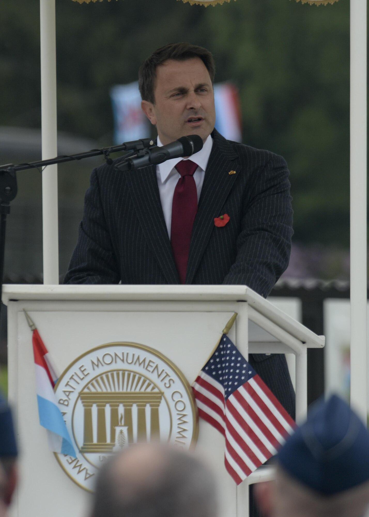 Xavier Bettel, the prime minister of Luxembourg, speaks during a Memorial Day ceremony at the Luxembourg American Cemetery and Memorial May 23, 2015. Memorial Day is observed on the last Monday of May, in remembrance of those who gave the ultimate sacrifice, and has origins beginning with the memorial observances for the Civil War. (U.S. Air Force photo/Staff Sgt. Joe W. McFadden) 