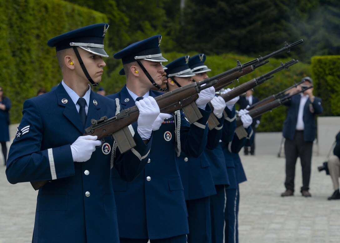 An honor guard detail executes a ceremonial volley during a Memorial Day ceremony at the Luxembourg American Cemetery and Memorial May 23, 2015. The base's Airmen also served as a ceremonial flight in service dress, caretakers of the cemetery's Luxembourg and U.S. flags, and escorts for guests to lay wreaths. (U.S. Air Force photo/Staff Sgt. Joe W. McFadden) 