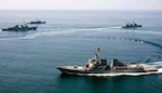 WATERS TO THE SOUTH OF THE KOREAN PENINSULA (May 25, 2015) - The Arleigh Burke-class guided-missile destroyer USS Lassen (DDG 82), front, conducts a trilateral naval exercise with the Turkish frigate FTCD Gediz (F-495) and Republic of Korea navy destroyers Seoae Ryu Seong-ryong (DDG 993) and Gang Gam-chan (DDH 979) in support of theater security operations. Lassen is on routine patrol in the U.S. 7th Fleet area of operations in support of security and stability in the Indo-Asia-Pacific region. 