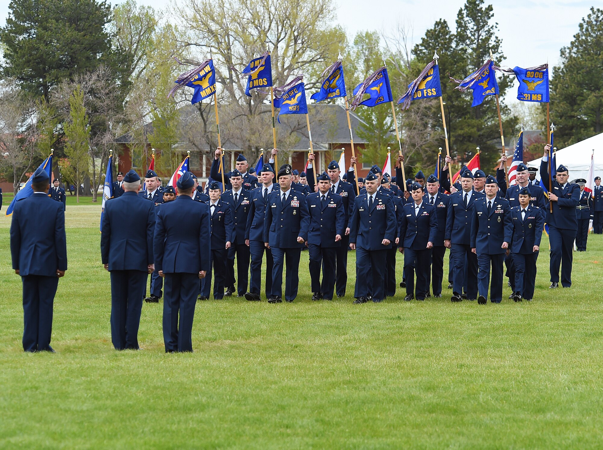 Squadron commanders and guidon bearers prepare to salute Col. Ronald Allen, commander of Airmen, during the 90th  Missile Wing’s change of command ceremony on F.E. Warren Air Force Base, Wyo. May 27, 2015.  Col. Stephen M. Kravitsky assumed command of the wing during the ceremony. (U.S. Air Force photo by R.J. Oriez)
