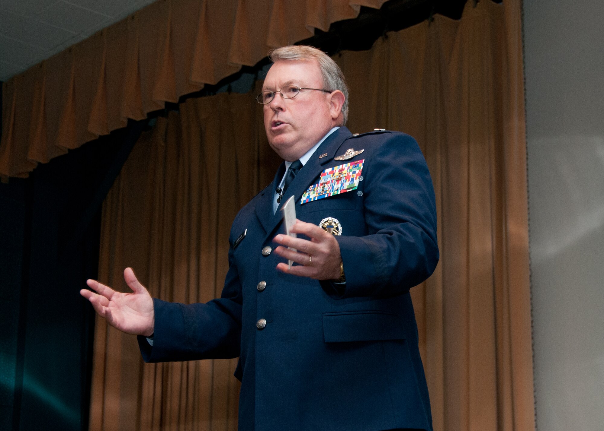 Retired Brig. Gen. Bryan Benson, who served as the Vance base commander from February 2005 to September 2006, shared his advice for a successful career Joint Specialized Undergraduate Pilot Training Class 15-09 during a ceremony May 21 in the Base Auditorium. Benson spoke about the myriad of aircraft that supported the Battle of Kamdesh during Operation Enduring Freedom in October 2009. (U.S. Air Force photo\Terry Wasson)