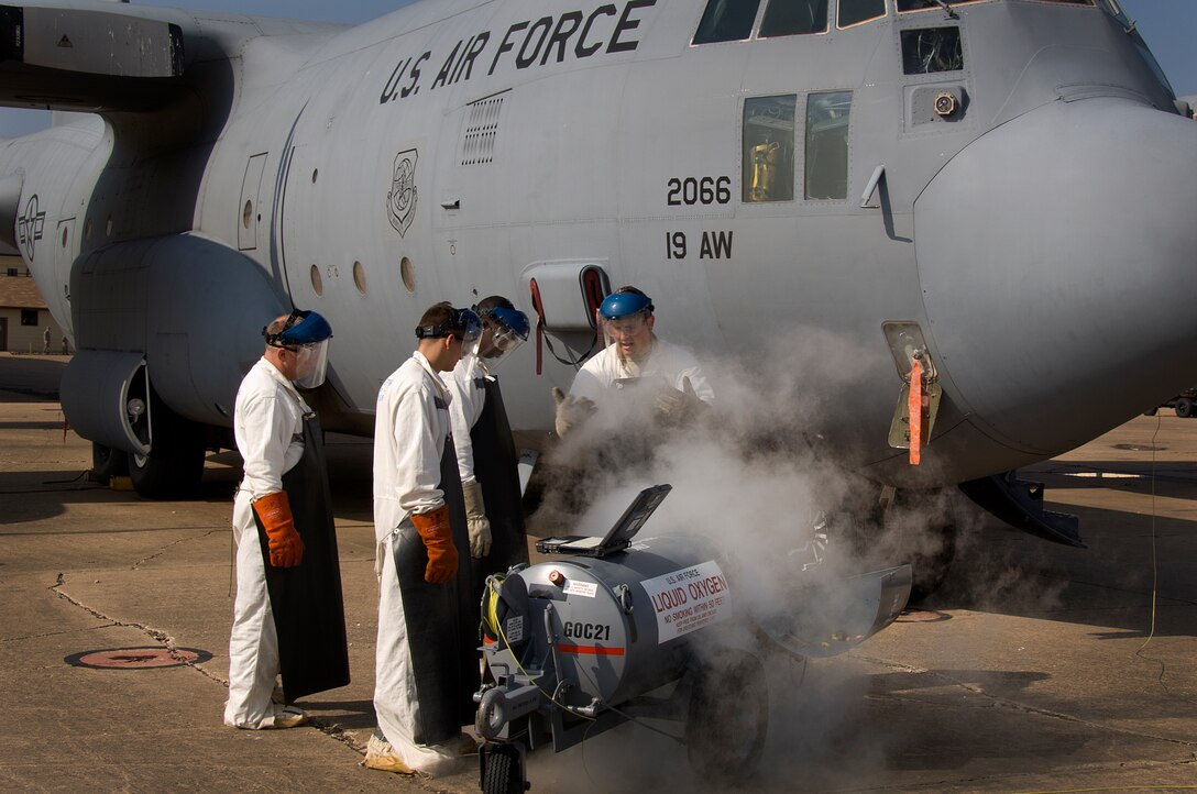 Staff Sgt. Ryan Lindsey, 362nd Training Squadron airlift instructor, trains his students on servicing a C-130 Hercules with liquid oxygen May 27, 2015, at Sheppard Air Force Base, Texas. The liquid oxygen is extremely cold with a boiling point of negative 297 degrees Fahrenheit and will be a part of the Airmen's everyday tasks when they graduate technical school and join operational flight lines across the Air Force. (U.S. Air Force photo by Danny Webb/ Released)