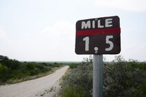 A trail marker from Troop 280’s 107-hour Eagle Scout project meant to improve the running trails of Laughlin Air Force Base, Texas, that began Nov. 19, 2014, and was finished April 30, 2015. With the help of Laughlin volunteers, Troop 280 was able to place markers on over 6 miles of running trails, which helped improve the quality of the trails for runners and hikers. (U.S. Air Force photo by Airman Brandon May)