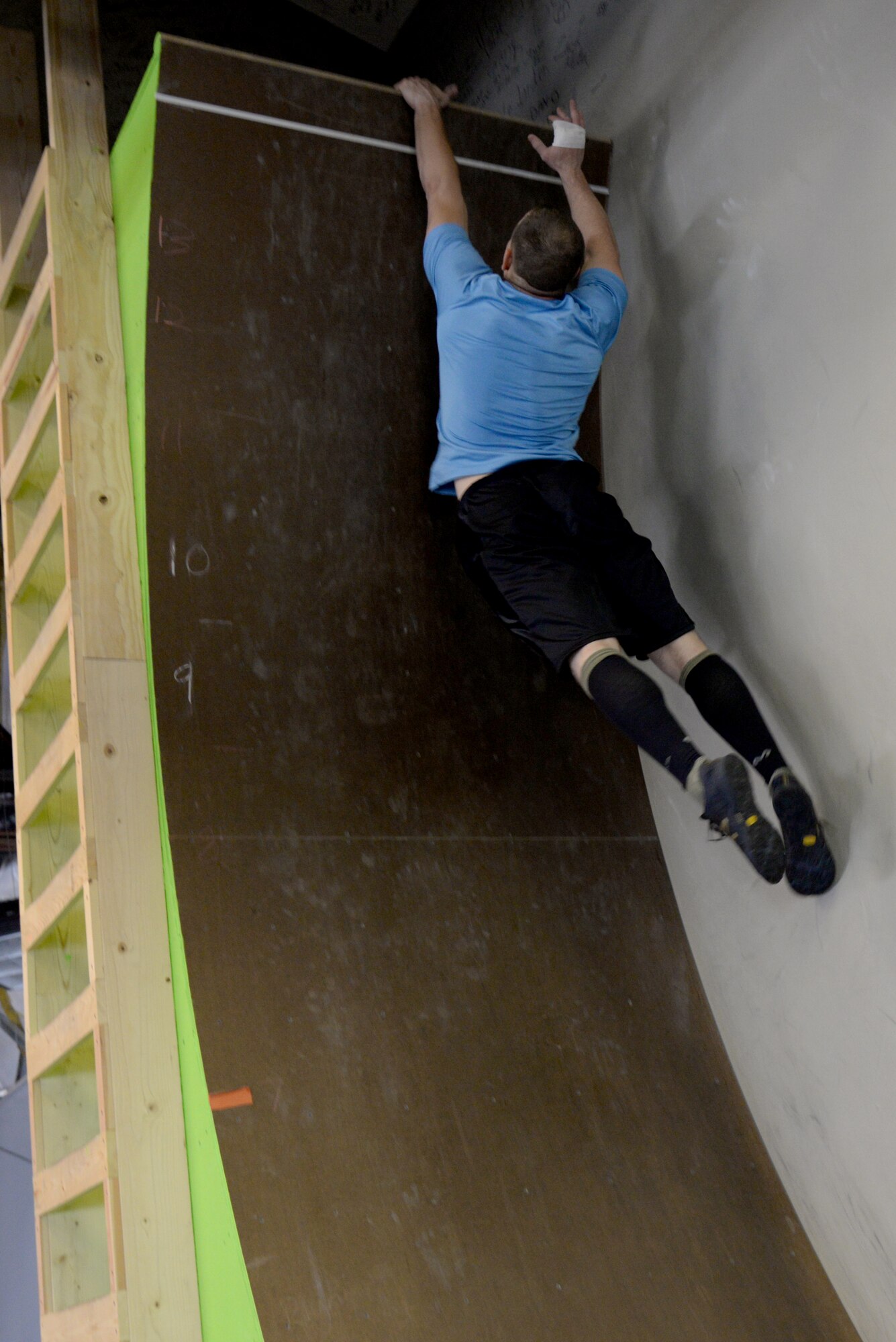 Staff Sgt. Randall Forsythe trains to compete on the TV show American Ninja Warrior May 21,2015. Forsythe, 375th Civil Engineer Squadron firefighter, found out he was selected to participate on a special military tribute episode in April.. (U.S. Air Force photo/Airman 1st Class Megan Friedl)