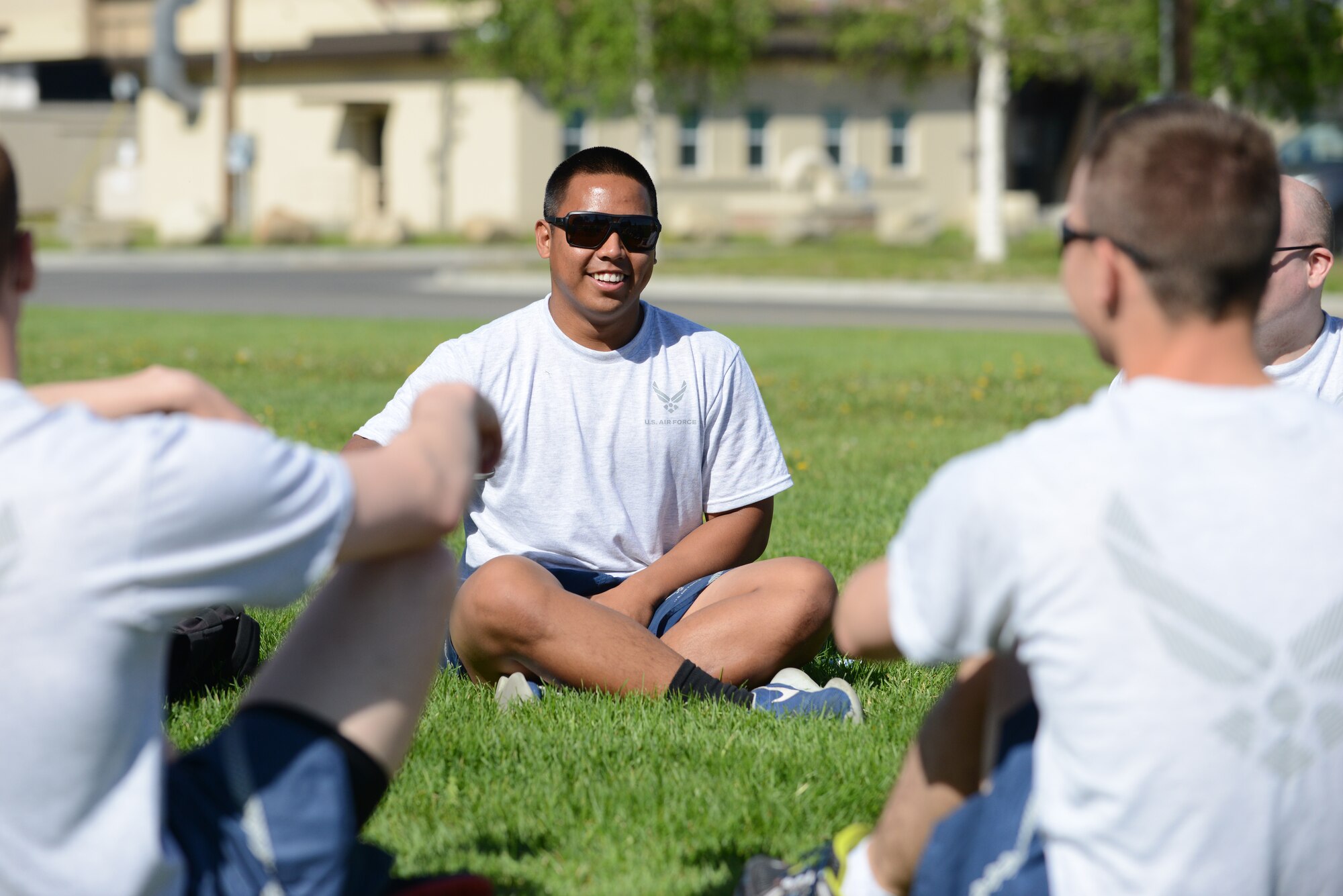 U.S. Air Force Senior Airman Algie Pillos, a 354th Communications Squadron cyber transport technician, talks with other Airmen during the Resilient Airman Day May 21, 2015, at Eielson Air Force Base, Alaska. Small group discussions and team building activities were set-up throughout the day as a way to build resilient Airmen. (U.S. Air Force photo by Senior Airman Ashley Nicole Taylor/Released)