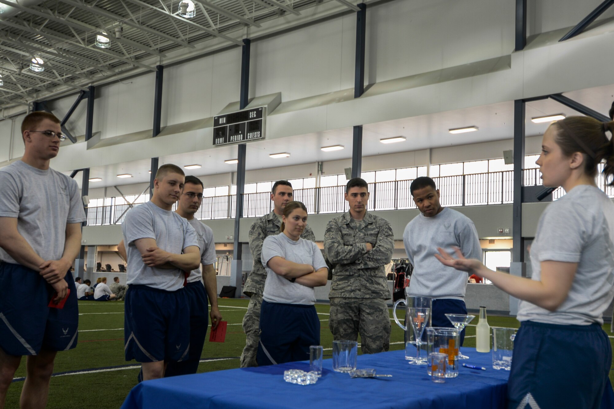 U.S. Air Force Airmen assigned to the 354th Fighter Wing learn about the standard size of an alcoholic beverage during the Alcohol Awareness and Safety Expo May 21, 2015, at the Baker Field House on Eielson Air Force Base, Alaska. The briefing taught Airmen safe drinking behaviors to mitigate safety risks. (U.S. Air Force photo by Senior Airman Ashley Nicole Taylor/Released)
