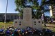 Flowers and wreaths sit on veteran memorial during the Memorial Day Ceremony at the Tom Green County Courthouse in San Angelo, Texas, May 26, 2015. The ceremony paid tribute to those who have lost their lives in all branches of the military. (U.S. Air Force photo by Senior Airman Michael Smith/Released)