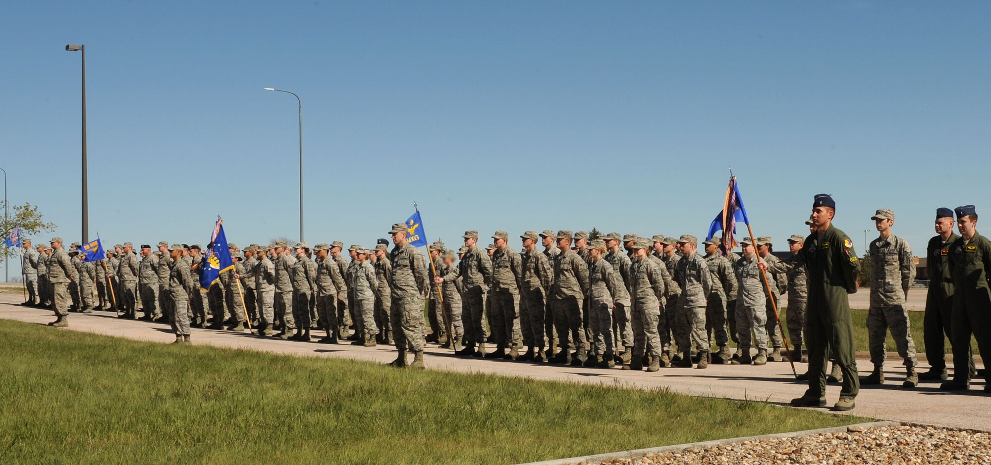 Formations comprised of Airmen from the four base groups and the 28th Bomb Wing staff participated in a Memorial Day retreat ceremony at Ellsworth Air Force Base, S.D., May 21, 2015. More than 15 veterans of World War II, Vietnam and the Korean War and their family members attended the event in remembrance of those who paid the ultimate sacrifice while defending our nation's freedom. (U.S. Air Force photo by Senior Airman Hailey R. Staker/Released)