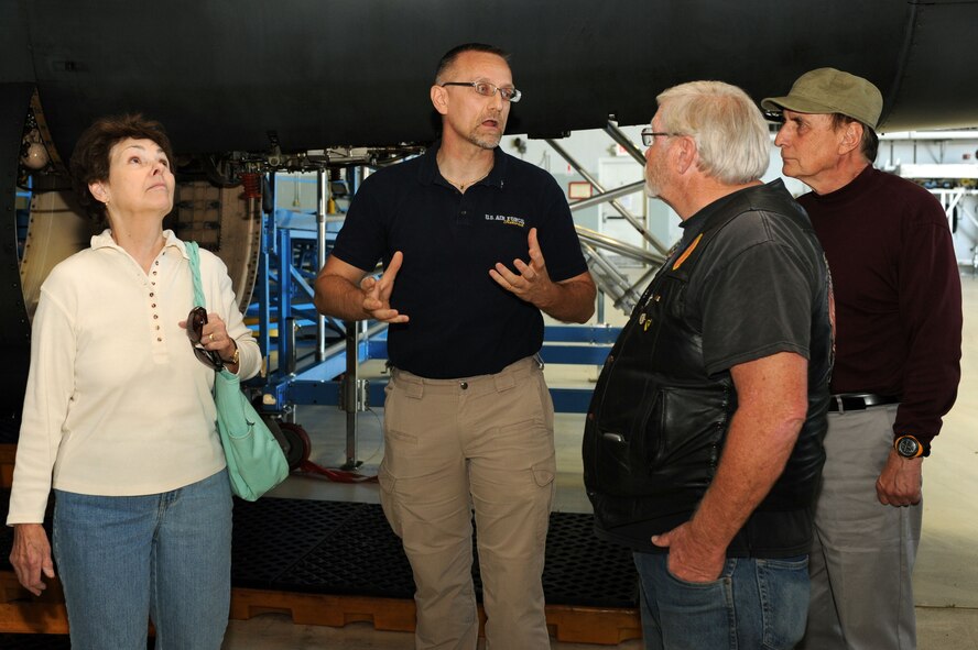 Retired Air Force Master Sgt. Travis Bolt (middle) speaks with Arnie Berbstrom and Brad Morgan (left), Vietnam War veterans, at a B-1 bomber display at Ellsworth Air Force Base, S.D., May 21, 2015. More than 15 Korean and Vietnam War veterans and their family members gathered at the South Dakota Air and Space Museum to meet with Ellsworth’s Airmen, tour the base and attend a retreat ceremony.  (U.S. Air Force photo by Senior Airman Hailey R. Staker/Released) 