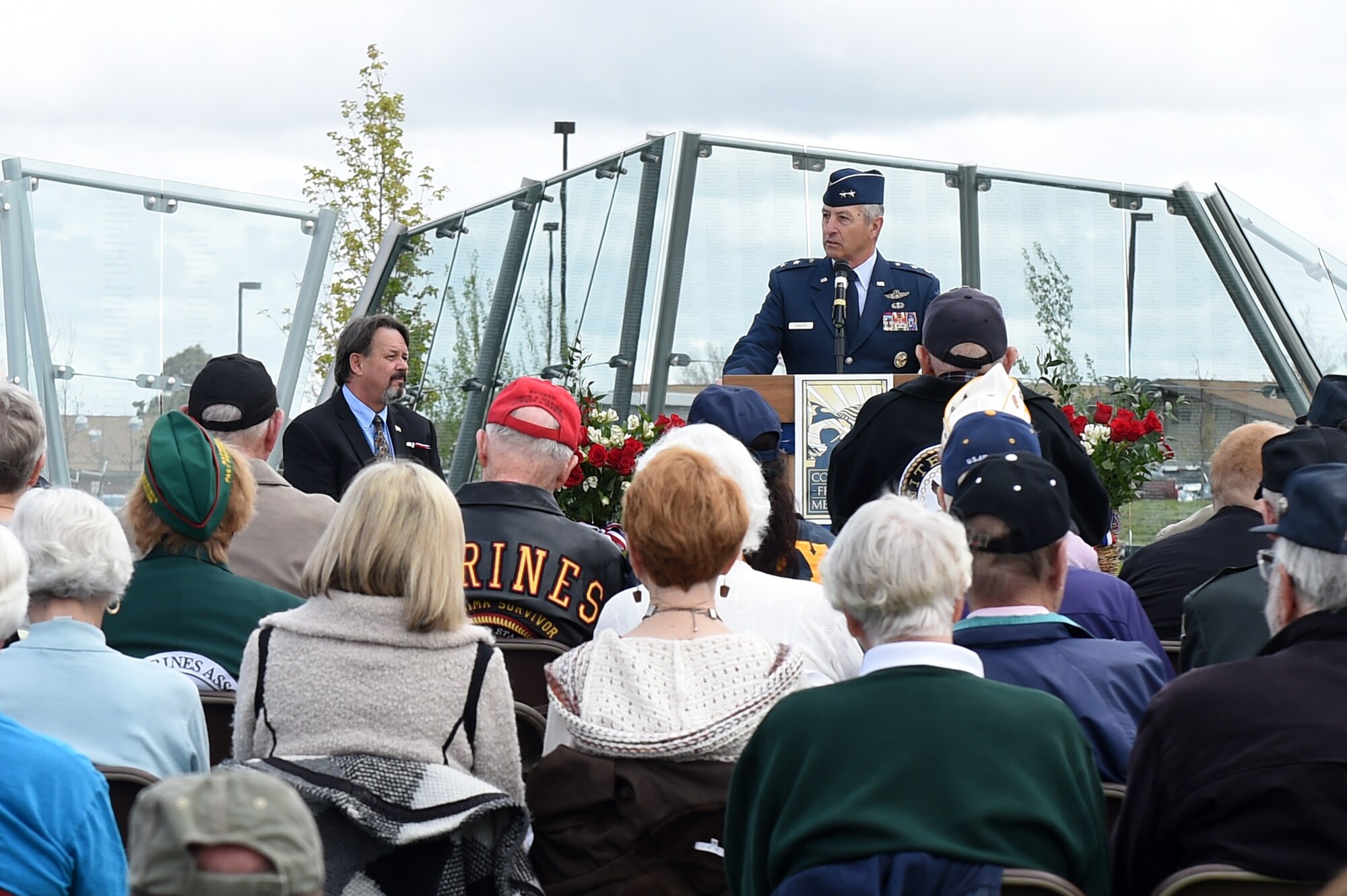 Maj. Gen. Michael Edwards, Adjutant General for Colorado, speaks to the crowd during the Memorial Day ceremony May 23, 2015, at the Colorado Freedom Memorial in Aurora, Colorado. This year’s ceremony had multiple guest speakers, flyovers, military displays and also marked the 70th anniversary of the end of World War II. (U.S. Air Force photo by Airman 1st Class Emily E. Amyotte/Released)