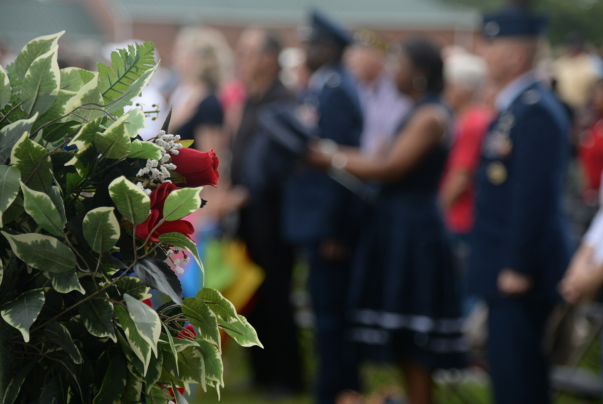 A wreath of roses is placed at the 2015 Biloxi National Cemetery Memorial Day ceremony, May 25, 2015, Biloxi, Miss. Local veterans, family members and Keesler Air Force Base and Naval Construction Battalion Center leadership attended to honor and remember the lives of fallen U.S. military heroes. (U.S. Air Force photo by Senior Airman Holly Mansfield)