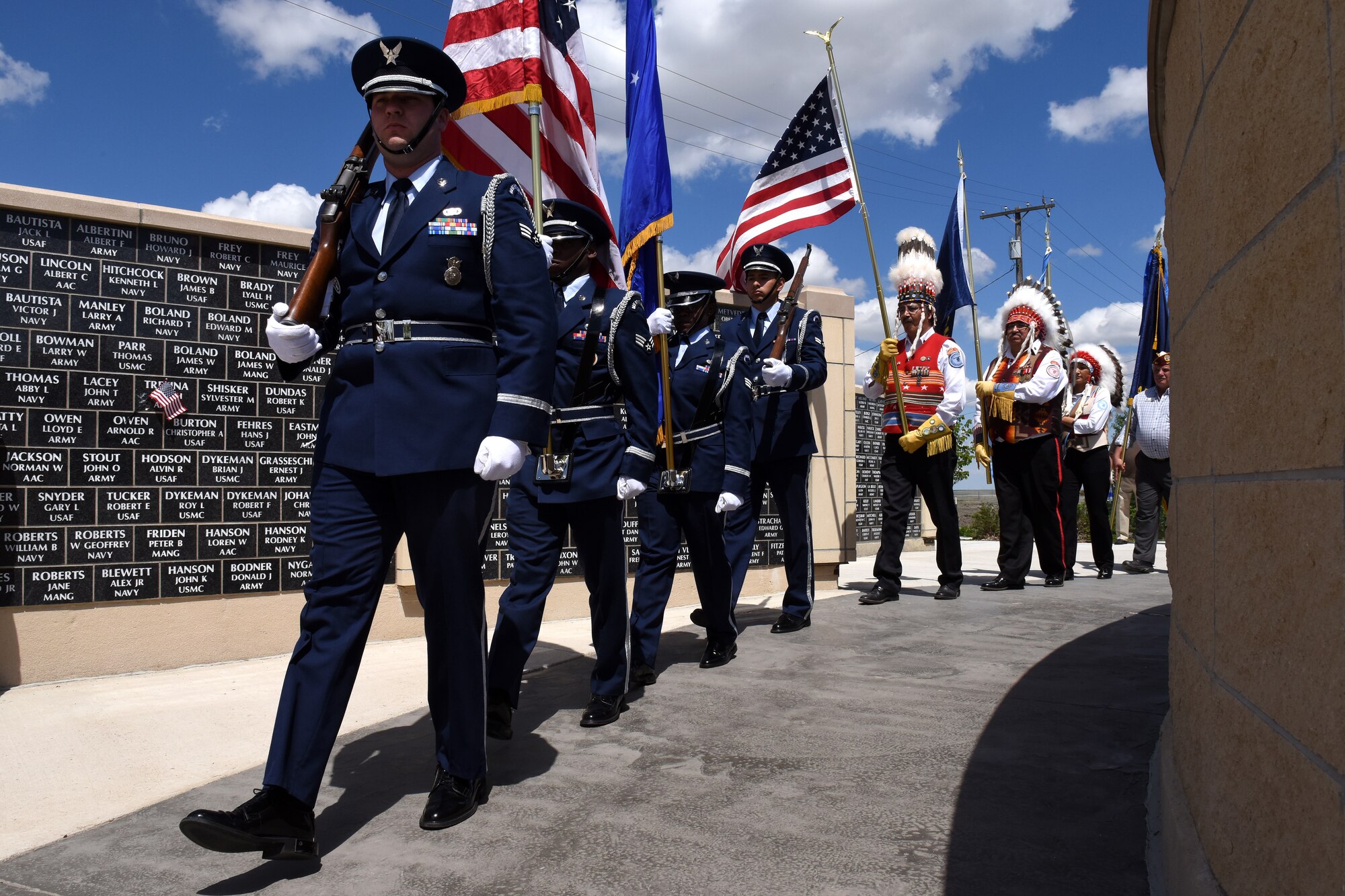 The Malmstrom Air Force Base Honor Guard present the colors during a ceremony at the Montana Veterans Memorial May 25, 2015, at Great Falls, Mont. Secretary of the Air Force Deborah Lee James and Air Force Chief of Staff Gen. Mark A. Welsh III asked that all American flags be lowered to half-staff in town squares, on military bases, private homes and American government facilities around the world in everlasting tribute to those who gave their all in our Nation’s defense. (U.S. Air Force photo/Chris Willis)