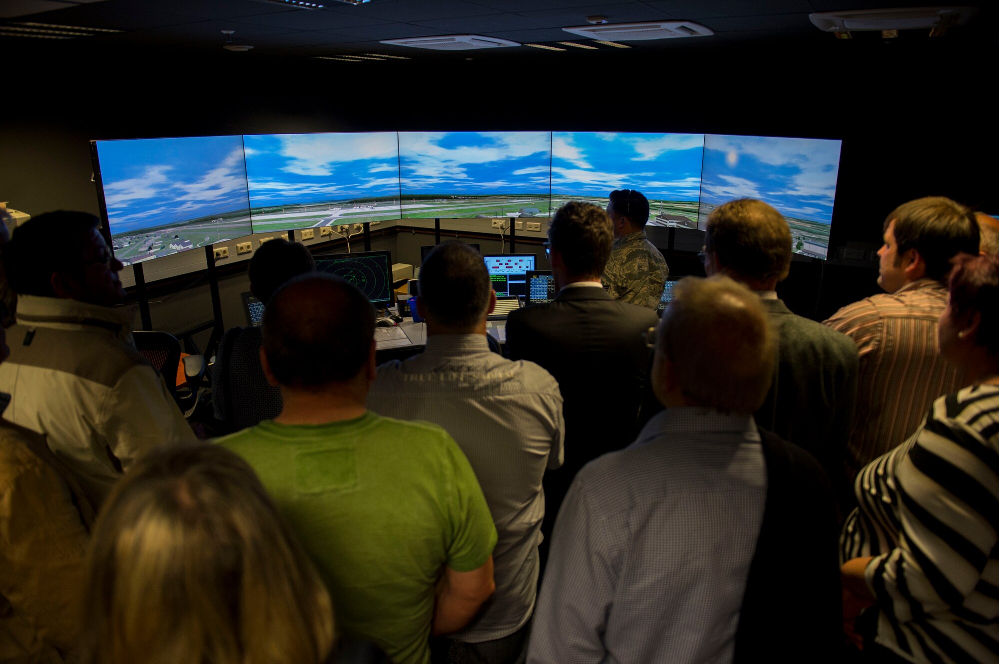 Community and business leaders of the Eifel region examine the Air Traffic Control Simulator Equipment during a visit to the air traffic control tower at Spangdahlem Air Base, Germany, May 22, 2015. The ATCSE is used to train air traffic controllers by simulating the view from the ATC tower while having the ability to change weather conditions, visibility and time of day during take-offs and landings of aircraft. Controllers may also utilize a feature allowing them a view from the pilot’s perspective. The leaders toured the air traffic control areas on the flightline as part of the 52nd Fighter Wing’s community relations program. (U.S. Air Force photo by Airman 1st Class Luke Kitterman/Released)
