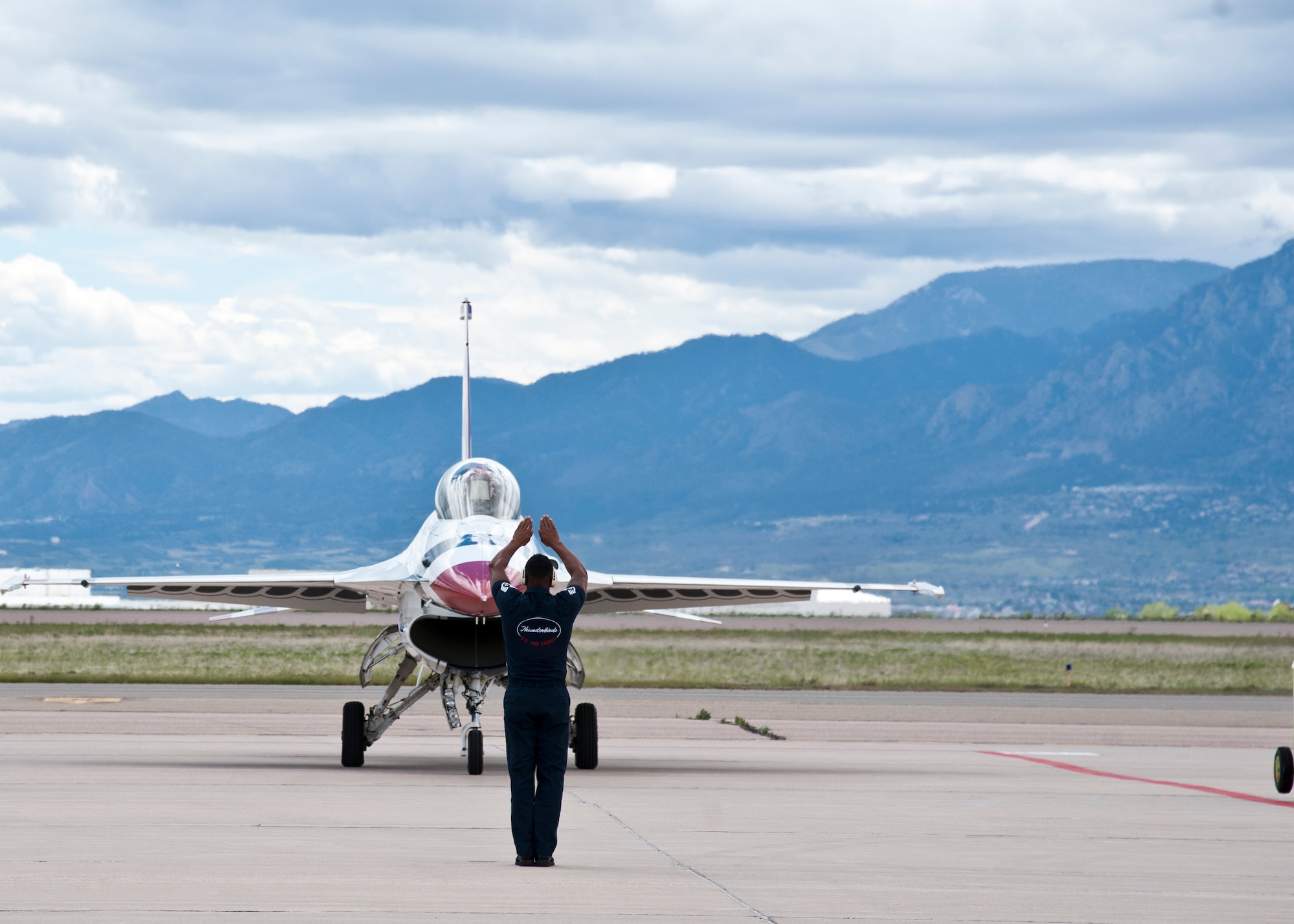 PETERSON AIR FORCE BASE, Colorado – The Air Force Air Demonstration Squadron, or Thunderbirds, arrived at Peterson AFB May 25 to perform at the Air Force Academy graduation and Aurora Air Show. America’s Ambassadors in Blue tour around the world to demonstrate their precision, excellence and dedication to representing Air Force Airmen. (U.S. Air Force photo by Senior Airman Tiffany DeNault)