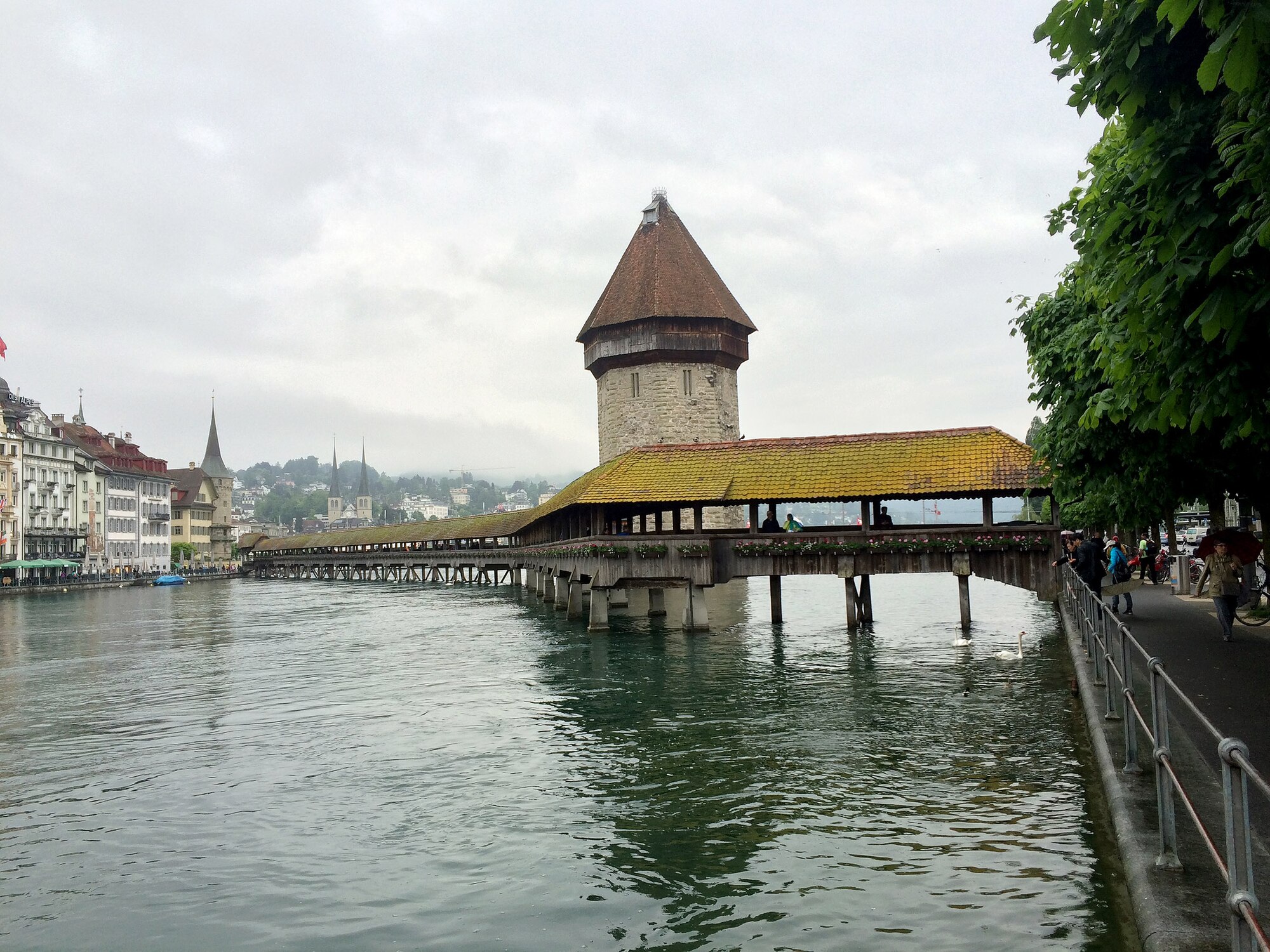 The famous covered, wooden bridge – Kapellbrücke – stretches across the Reuss River in Lucerne, Switzerland. The bridge was constructed in the 1300s to connect the two sides of the town and protect against enemy attacks. It is the oldest truss bridge in the world. (U.S. Air Force photo by Staff Sgt. R.J. Biermann/Released)
