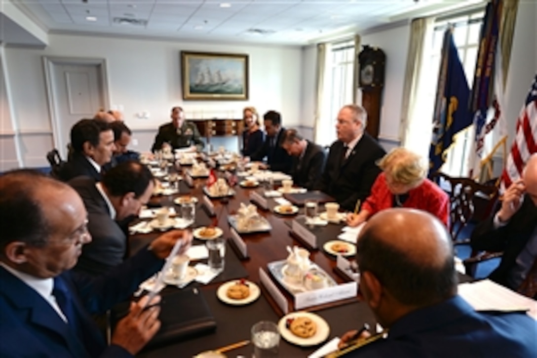 U.S. Deputy Defense Secretary Bob Work, right center, meets with Tunisian Minister of Defense Farhat Horchani, third from left, at the Pentagon, May 27, 2015. The two leaders discussed matters of mutual importance.