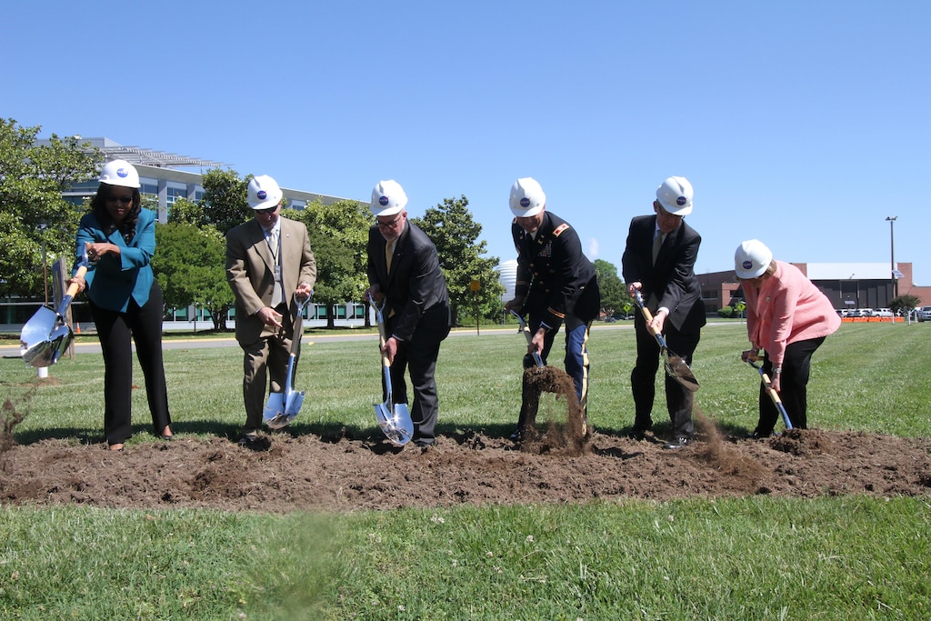 HAMPTON, Va. -- Leaders break ground for the NASA Computational Research Facility  at NASA Langley Research Center May 22, 2015.  Pictured, left to right, are Shannon Kendrick, district director for the office of U.S. Rep. Scott Rigell; Erik Weiser, acting director of center operations at NASA Langley; David Bowles, acting center director at NASA Langley; Col. Paul Olsen, commander, Norfolk District, U.S. Army Corps of Engineers; Christian Jahrling, vice president of Turner Construction Co.; and Linda Curtis, vice mayor of the City of Hampton. The 40,000-square-foot center, the construction of which will be overseen by the Norfolk District and carried out by Turner Construction Co., will provide a consolidated data center and high-density office space. (U.S. Army photo/Kerry Solan