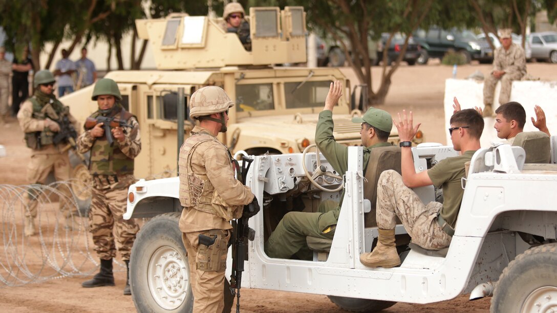 U.S. Marines, Moroccan, Belgium and Dutch soldiers demonstrate vehicle checkpoint procedures May 20 in the Tifnit, Morocco training area. A checkpoint and search process was one of several demonstrations as general officers from participating countries observed what had been accomplished during the week-long training at the camp as a part of Exercise African Lion 2015. Exercise African Lion 15 is an annually-scheduled, combined U.S.–Moroccan exercise designed to improve mutual understanding of each nation’s tactics, techniques and procedures while demonstrating the strong bond between the two nation’s militaries.  The one-week exercise includes various types of military training, including a command post exercise; stability operations, such as nonlethal weapons training and crisis/disaster response training.  Additionally, in February an intelligence capacity building seminar was conducted.