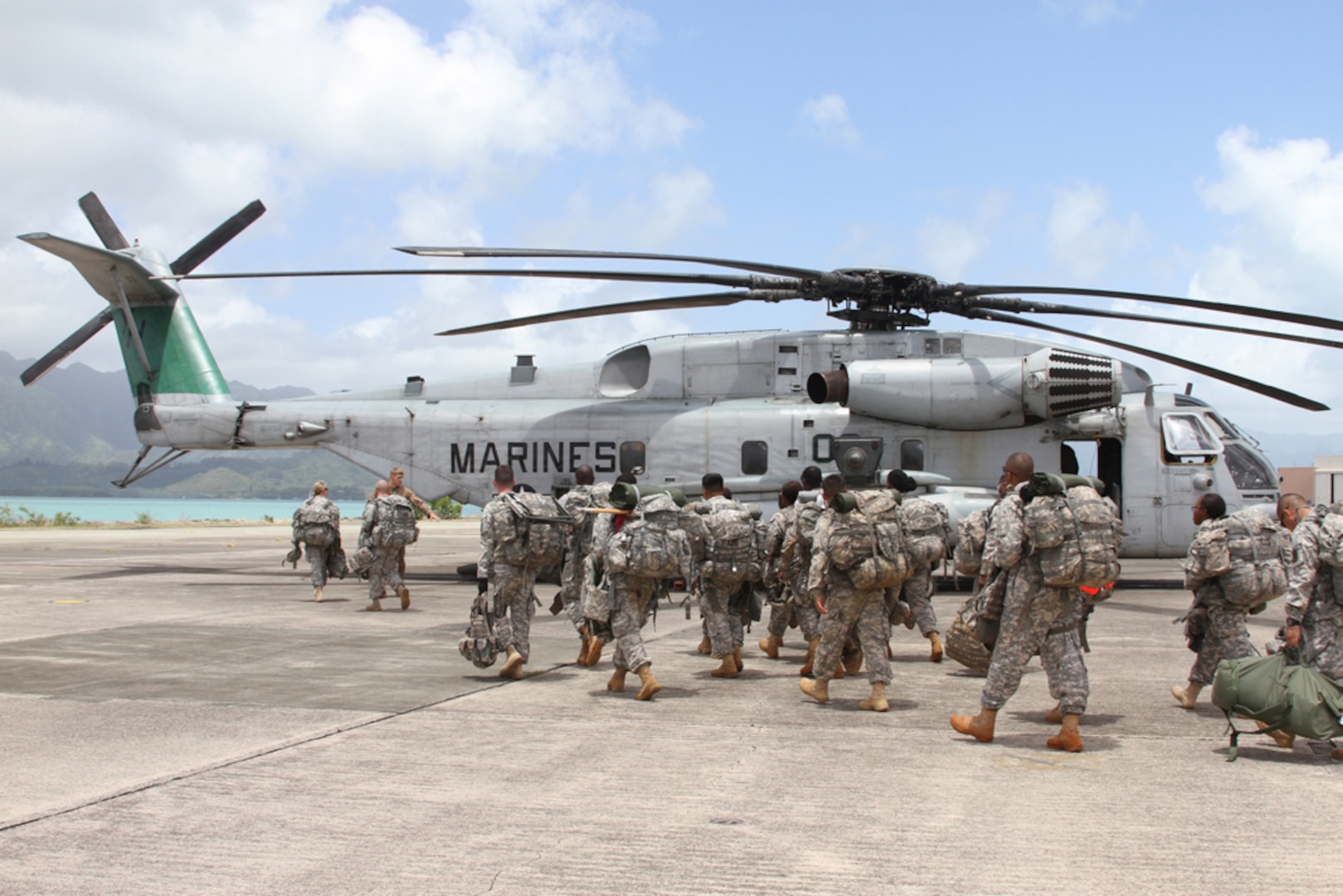 In this file photo, Sgt. Erin SherwoodTroops of the 45th Sustainment Brigade prepare to board a Marine Corps CH-53E Sea Stallion at Marine Corps Base Hawaii in Kaneohe, Hawaii, April 30. They were transported to Pohakuloa Training Area on the Big Island for a three week long training exercise that will prepare them for future missions in the Pacific region and other areas of the world. 