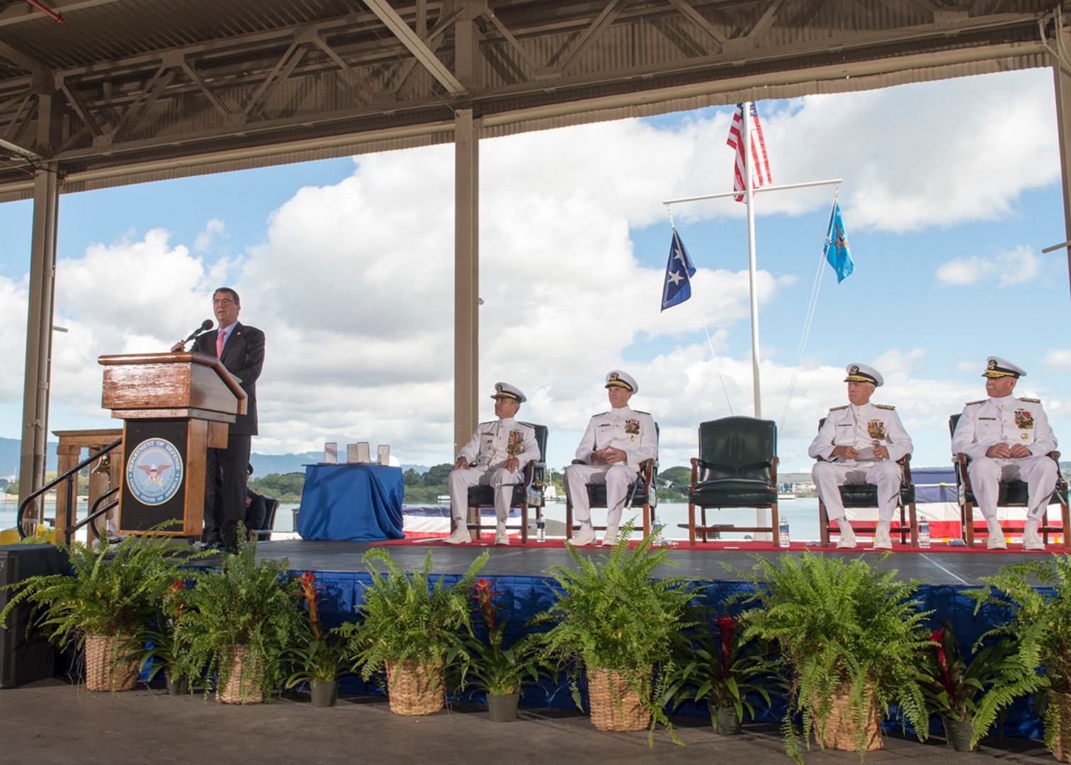PEARL HARBOR (May 27, 2015) - U.S. Pacific Command (USPACOM) and U.S. Pacific Fleet (USPACFLT) held a joint change of command ceremony at Joint Base Pearl Harbor-Hickam. During the dual ceremony, Adm. Scott H. Swift relieved Adm. Harry B. Harris Jr. as the PACFLT commander and Harris assumed command of USPACOM from Adm. Samuel J. Locklear III.  