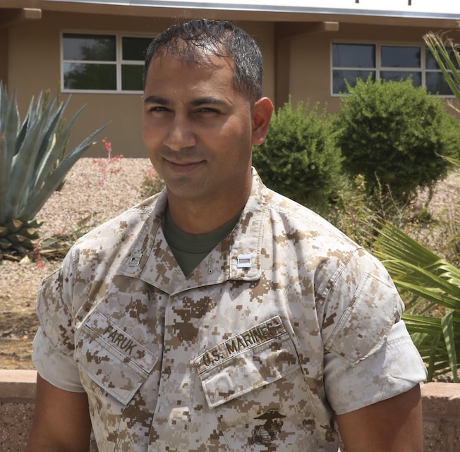 Capt. Sheik Faruk, Combat Center Aide-De-Camp, native of Georgetown, Guyana, has served in his current billet for a year. His military occupational specialty is an engineer officer. As a child, he learned a lot of his engineering skills from his father and hopes to one day take over the family business. (Official Marine Corps photo by Lance Cpl. Medina Ayala-Lo/Released)