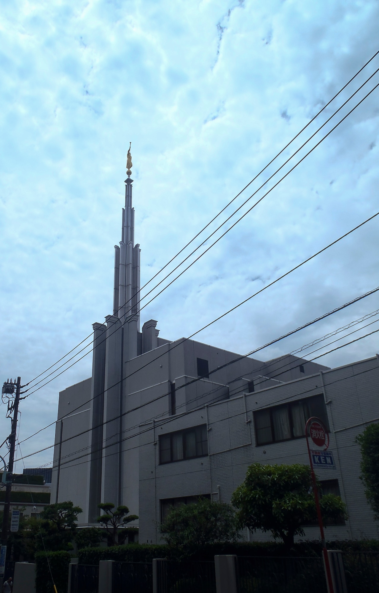 A view of the Tokyo Japan Temple which is across the street from Arisugawa Park, Minato, Japan, May 25, 2015. It was the first temple built in Japan. An Angel Moroni statue was added to the spire of the temple Dec. 10, 2004. (U.S. Air Force photo by Senior Airman David Owsianka/Released)