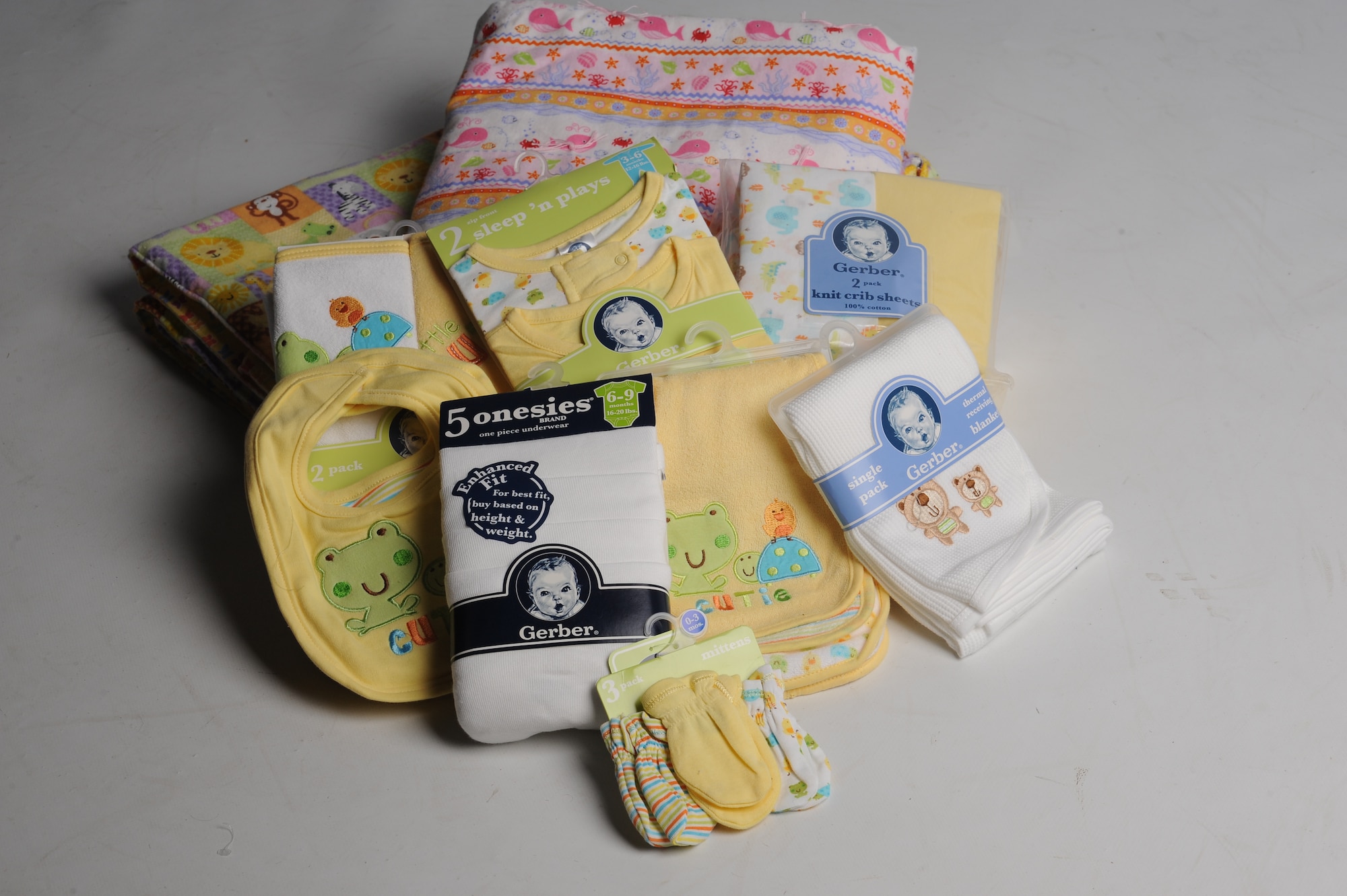 The Airman and Family Readiness Center hosted Bundles for Babies May 27, 2015, on Buckley Air Force Base, Colo. The class is offered to expecting and new parents and covers a range of topics such as car seat safety, nutrition, fitness, mental health, dividing childcare and chores, navigating common disagreements between spouses, and a family budgeting session. At the end of the class, each family gets to take home a “bundle” that contains bibs, onesies, pajamas, burp towels, bath towels, crib sheets and mittens sponsored by the Air Force Aid Society. (U.S Air Force photo by Airman 1st Class Samantha Meadors/Released)