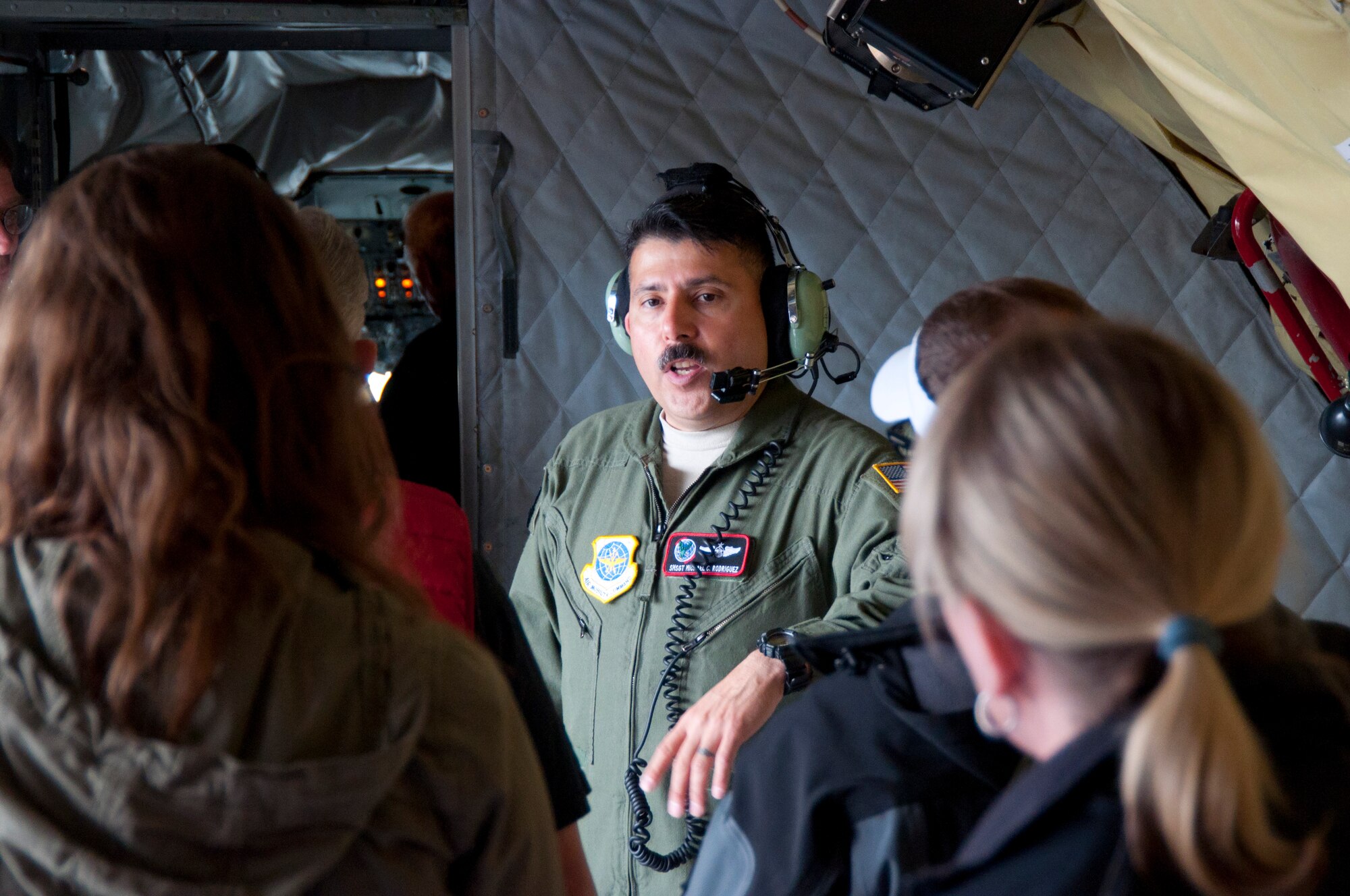 Senior Master Sgt. Michael Rodriguez, 92nd Air Refueling Squadron superintendent and boom operator, shares facts about the KC-135 Stratotanker air refueling aircraft with members of the West Plains Chamber of Commerce prior to an orientation flight May 26, 2015, at Fairchild Air Force Base, Wash. The 92nd Air Refueling Wing flew the WPCC members as part of the Air Force’s broader civic outreach program designed to provide local civic leaders and businesspeople with an increased understanding of and appreciation for the Air Force’s various missions and capabilities. (U.S. Air Force Photo/Capt. David A. Liapis)