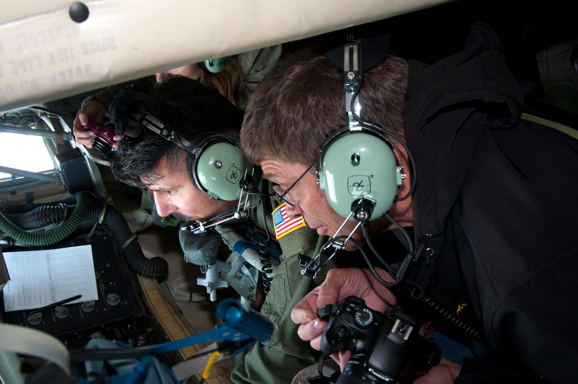 Patrick Rushing, Mayor of Airway Heights, Wash. and West Plains Chamber of Commerce member, watches while Senior Master Sgt. Michael Rodriguez, 92nd Air Refueling Squadron superintendent and boom operator, controls the boom while refueling a C-17 Globemaster III cargo aircraft from Joint Base Lewis-McChord, Wash., May 26, 2015, on an orientation flight that took off from Fairchild Air Force Base, Wash. The 92nd Air Refueling Wing flew the WPCC members as part of the Air Force’s broader civic outreach program designed to provide local civic leaders and businesspeople with an increased understanding of and appreciation for the Air Force’s various missions and capabilities. (U.S. Air Force Photo/Capt. David A. Liapis)