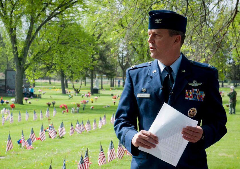 Col. Jason Armagost, 5th Bomb Wing commander, speaks during a Memorial Day event at Rosehill Cemetery in Minot, N.D., May 25, 2015. Memorial Day is a day of remembrance for the men and women who have passed while serving in the armed forces. (U.S. Air Force photo/Airman 1st Class Sahara L. Fales)