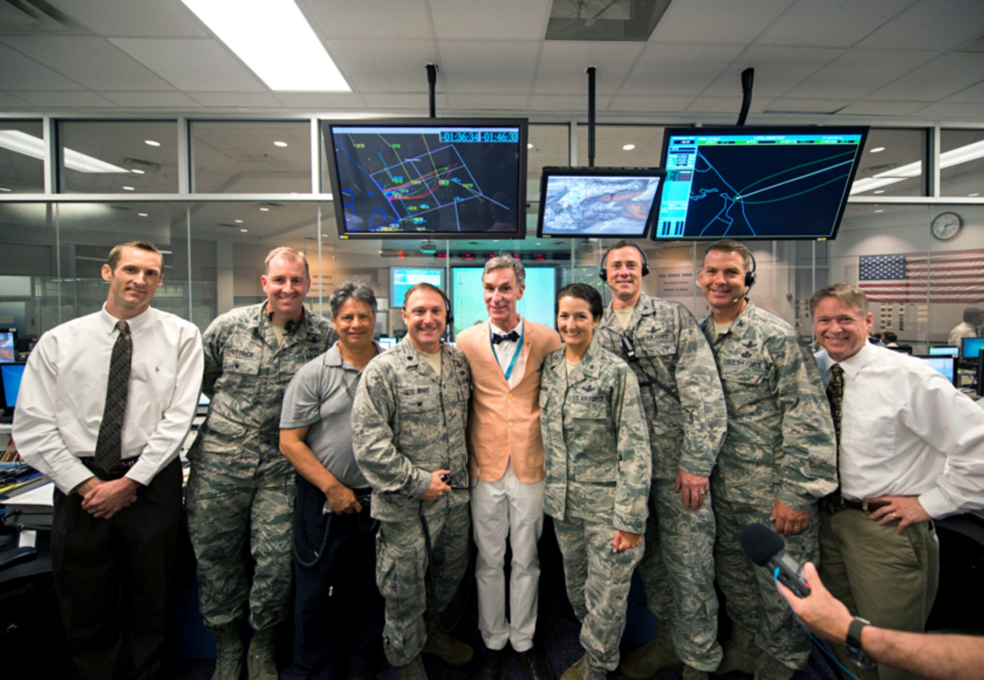 Brig. Gen. Nina Armagno, 45th Space Wing commander, and launch team, pose with Bill Nye, Planetary Society CEO, in the Morrell Operations Center, May 21, 2015, at Cape Canaveral Air Force Station, Fla. Team Patrick-Cape hosted Bill Nye the Science Guy and the Planetary Society team for a tour of CCAFS and met with several Airmen. (Courtesy photo/Navid Baraty/ Planetary Society) (For limited release)