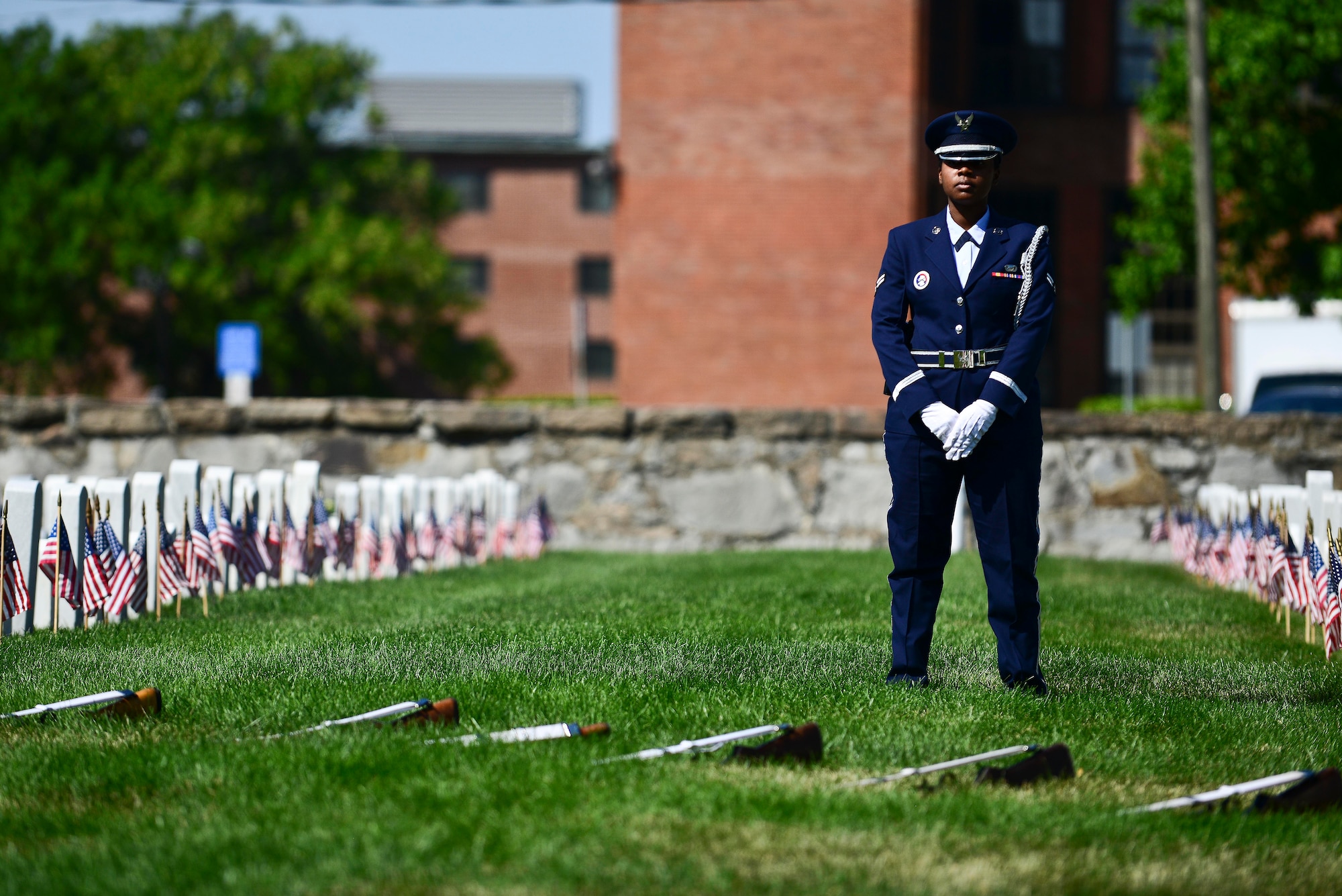 A U.S. Air Force Airman stands at parade rest during a Memorial Day Ceremony in Hampton, Va., May 25, 2015. The Langley Honor Guard participated in the ceremony with a 21-gun salute and presentation of the Air Force Flag in recognition and to salute fallen Service members. (U.S. Air Force photo by Senior Airman Kimberly Nagle/Released)  