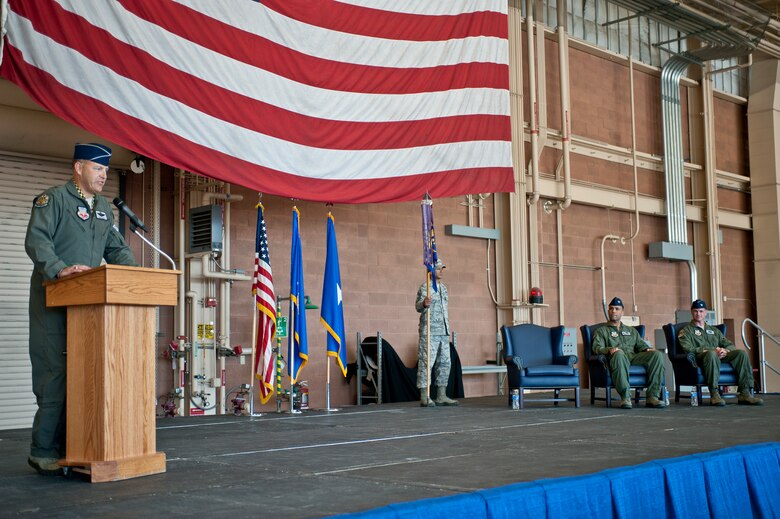 Brig. Gen. Christopher Short (left), 57th Wing commander, speaks during the U.S. Air Force Weapons School’s change of command ceremony at Nellis Air Force Base, Nev., May 26, 2015. During the ceremony, Col. Michael Drowley -- who served at Nellis AFB as a USAFWS instructor in 2004, the 57th WG’s chief of fighter standardization and evaluation in 2006, and the commander of the 66th WPS in 2011 -- became the USAFWS’s new commandant. (U.S. Air Force photo by Staff Sgt. Siuta B. Ika)