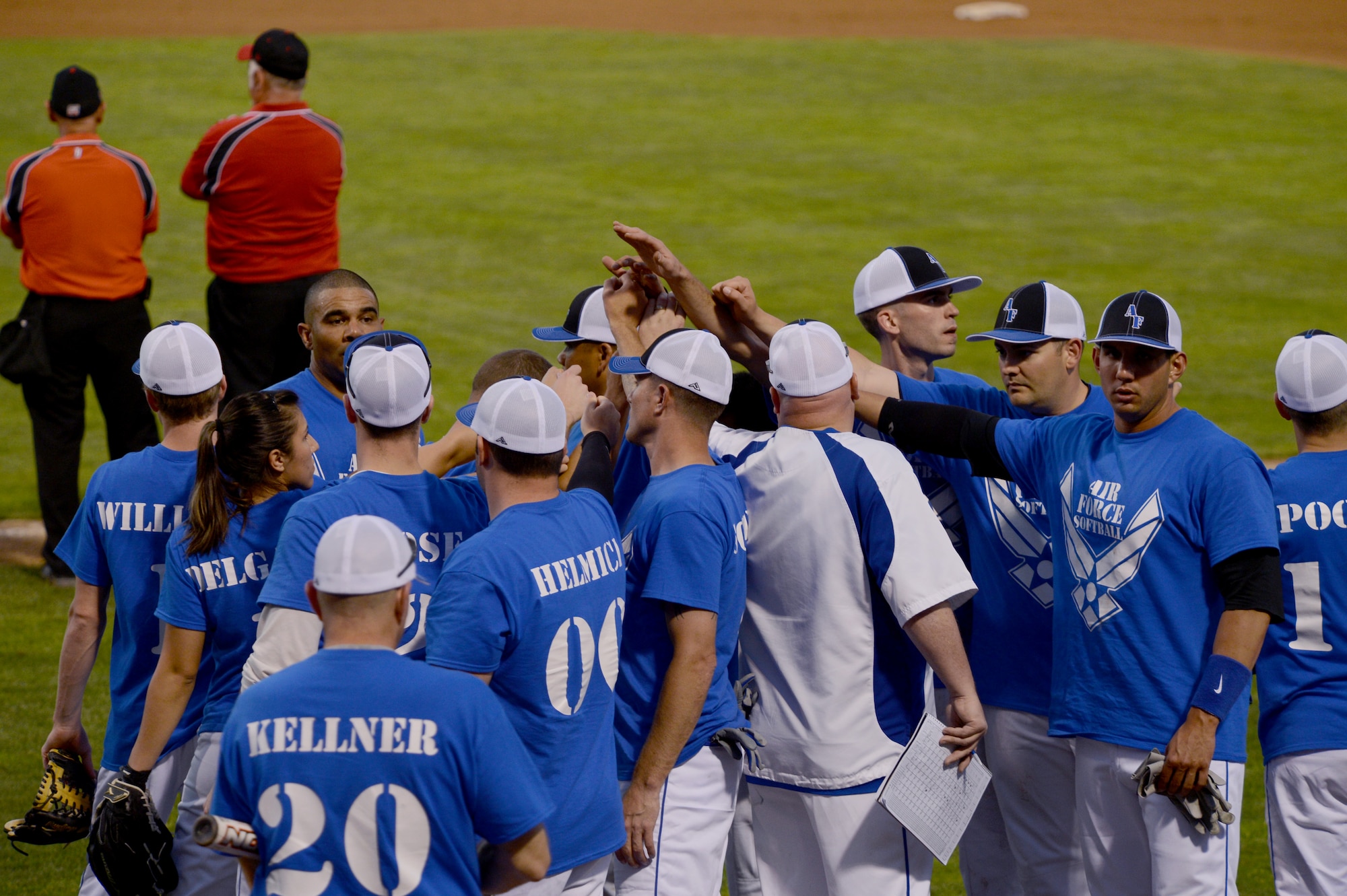 Players on the McChord Field Air Force Softball Team congratulate each other after a game May 20, 2015, at Cheney Stadium in Tacoma, Wash. The tournament gave service members an opportunity to hear their names on the loud speakers and see their player profile on the big screen while playing the game they loved. (U.S. Air Force photo/Airman 1st Class Keoni Chavarria)