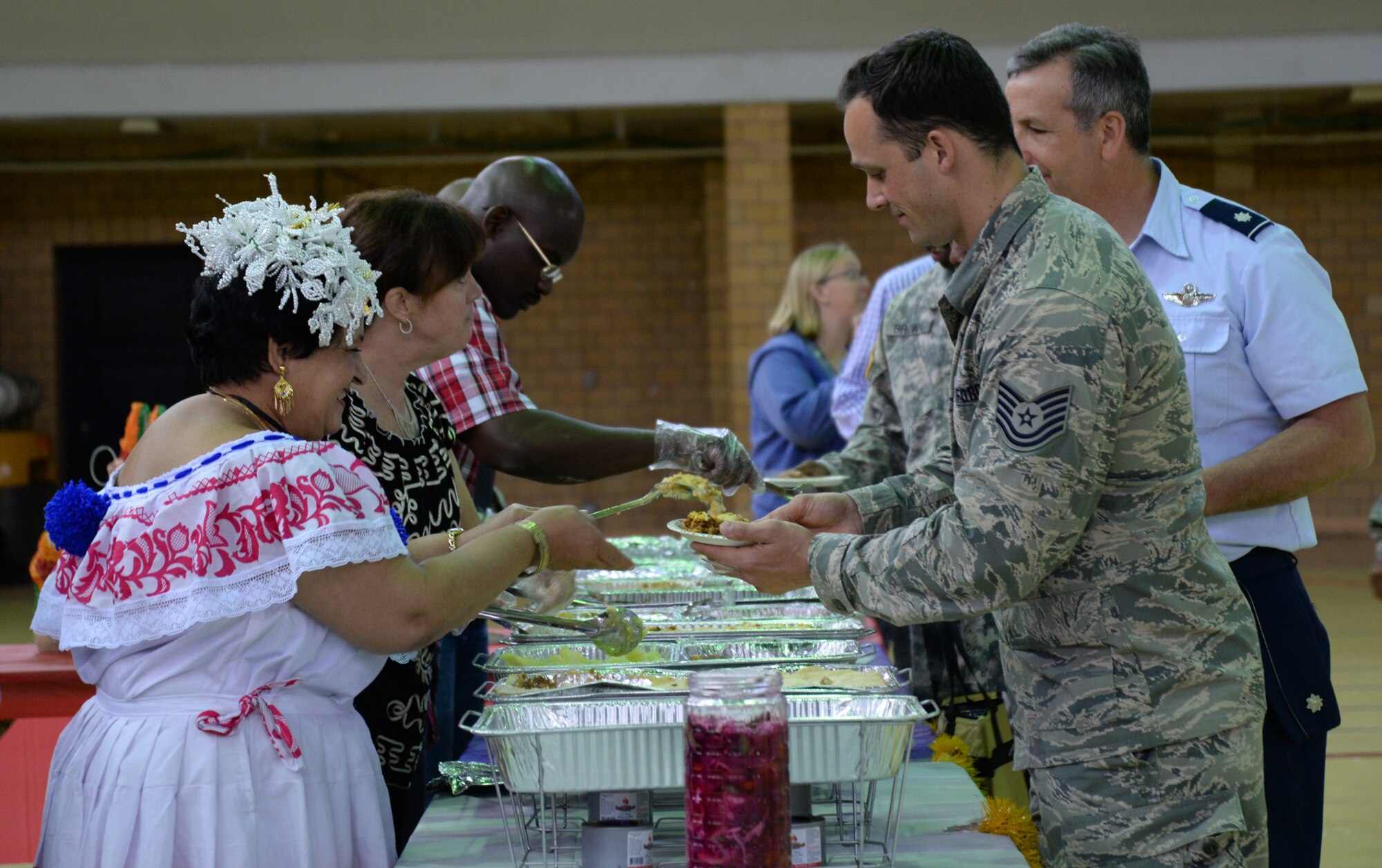 Chief Warrant Officer Jennings serves Latin American food samples at Unity Day May 21 at the 5th Regiment Armory in Baltimore. Unity Day has existed since 2006. (Photo by Airman 1st Class Enjoli M. Saunders/RELEASED)  