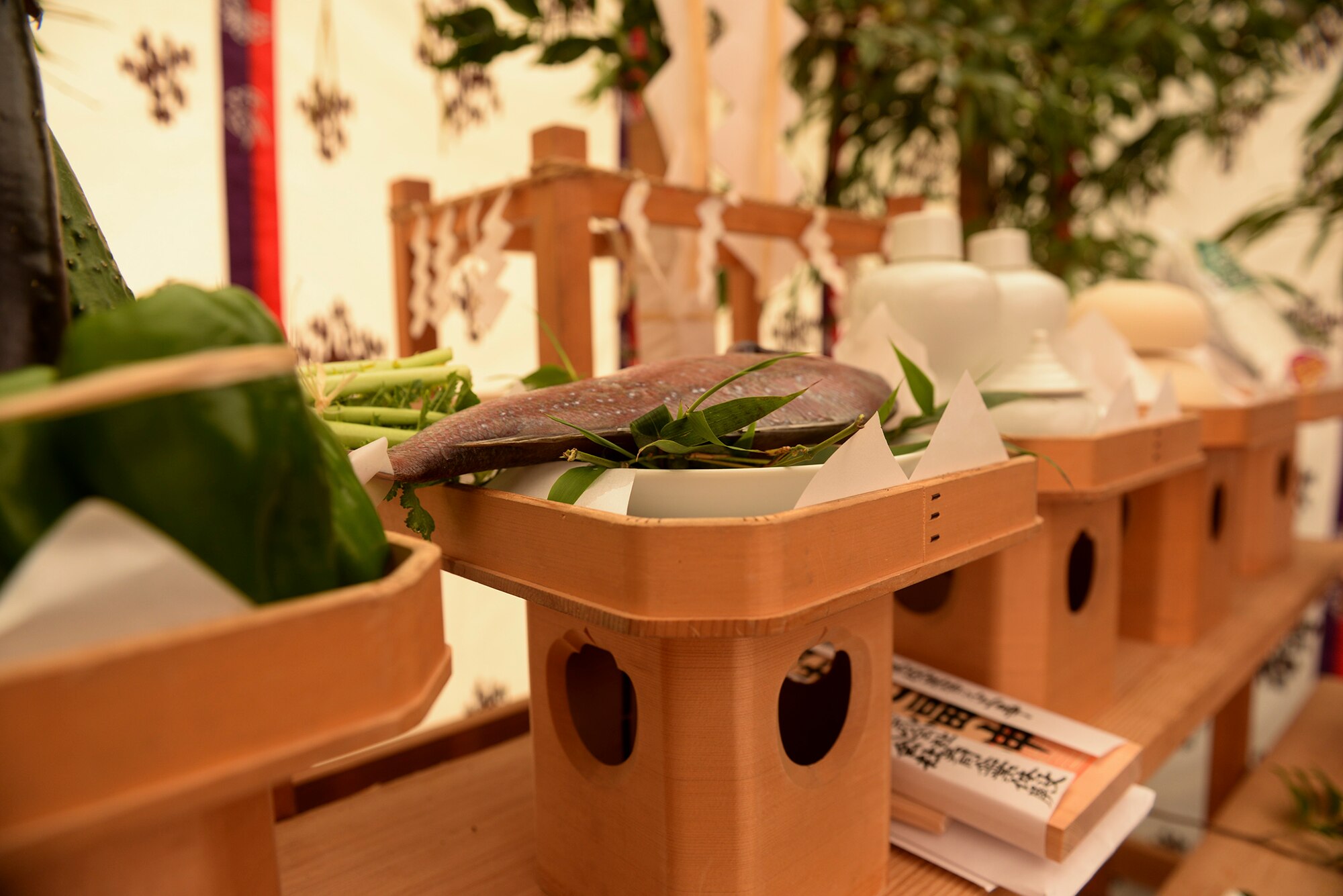 Food items are offered to the gods at the ground breaking ceremony for the new Yokota High School at Yokota Air Base, Japan, May 19, 2015.The new high school project includes plans for art, science and computer labs; an information center; a media room; special education facilities; a teacher workroom and administration offices. 