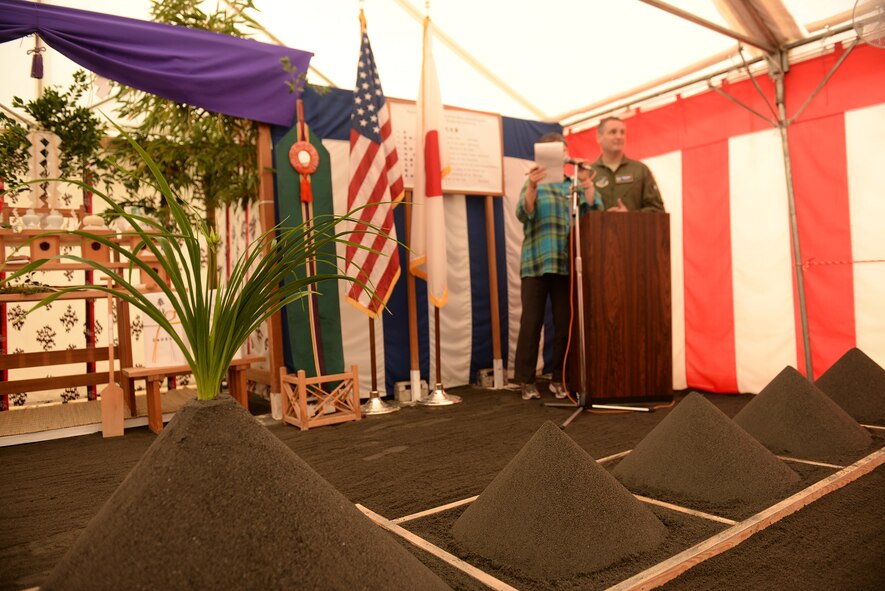 Col. Douglas Delamater, 374th Airlift Wing commander, delivers remarks during the new Yokota High School ground breaking ceremony at Yokota Air Base, Japan, May 19, 2015. The new high school is slated to open August, 2017. 