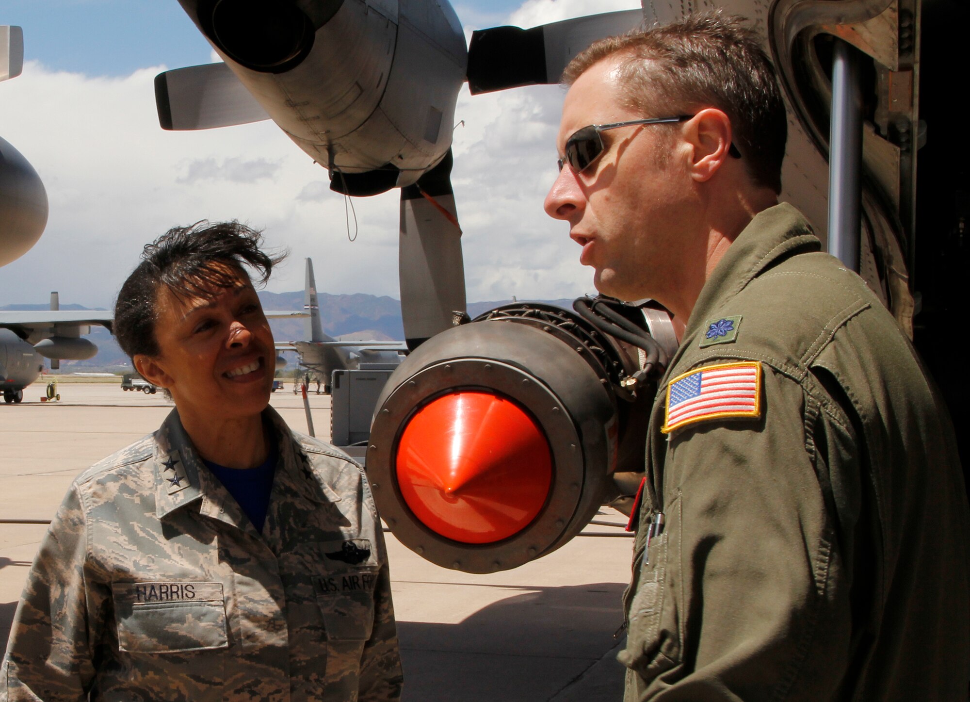 Modular Airborne Fire Fighting System-qualified C-130 aircraft commander, Lt. Col. Robert Fairbanks of the 731st Airlift Squadron, right, shows Maj. Gen. Stayce Harris, 22nd Air Force commander, a MAFFS-equipped C-130 during her visit to the 302nd Airlift Wing here May 15, 2015. The general spent two days with the Air Force Reserve Command wing to get a firsthand look at annual MAFFS training. “That was a great introduction into what we do with the MAFFS mission here at the 302nd,” said Harris. “It is challenging flying. Everyone takes it very seriously because, at the end of the day, what we’re trying to do is save lives and protect property from destruction. They’re challenging situations but every crewmember here is expertly trained and absolutely ready for it.” (U.S. Air Force photo/Staff Sgt. Nathan Federico)