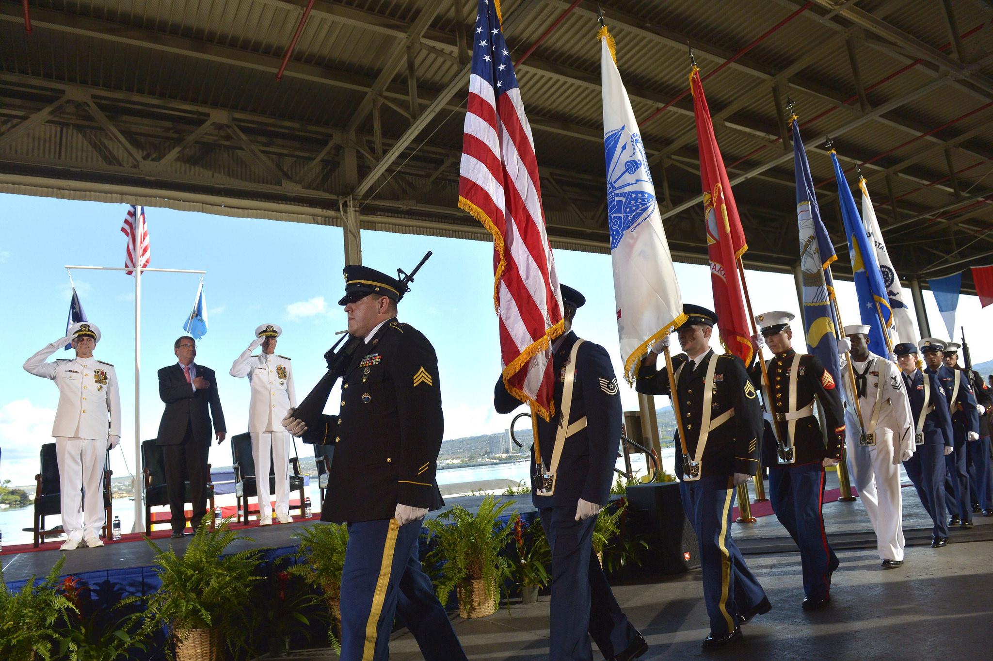 A jointservice color guard posts the colors as, from left, Chief of