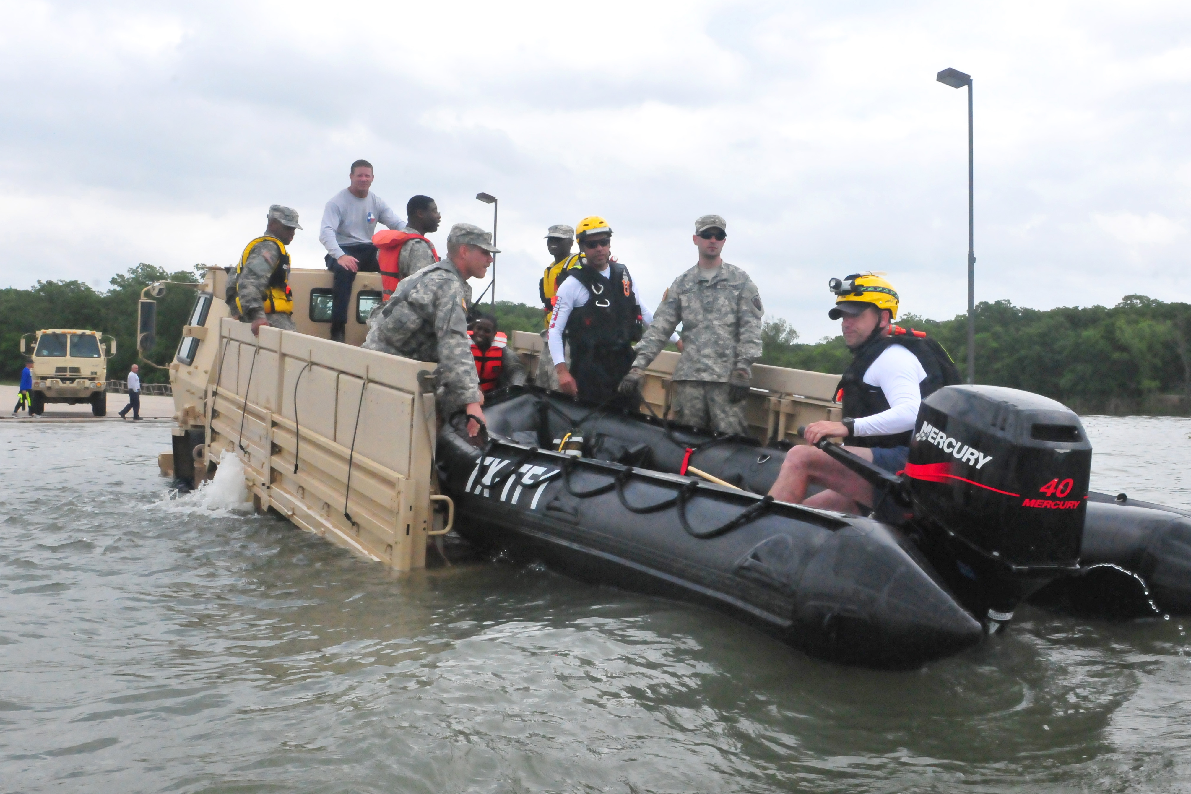 Texas Army National Guardsmen Conduct Critical Water Rescue Rehearsals With First Responders From Helicopter Search And