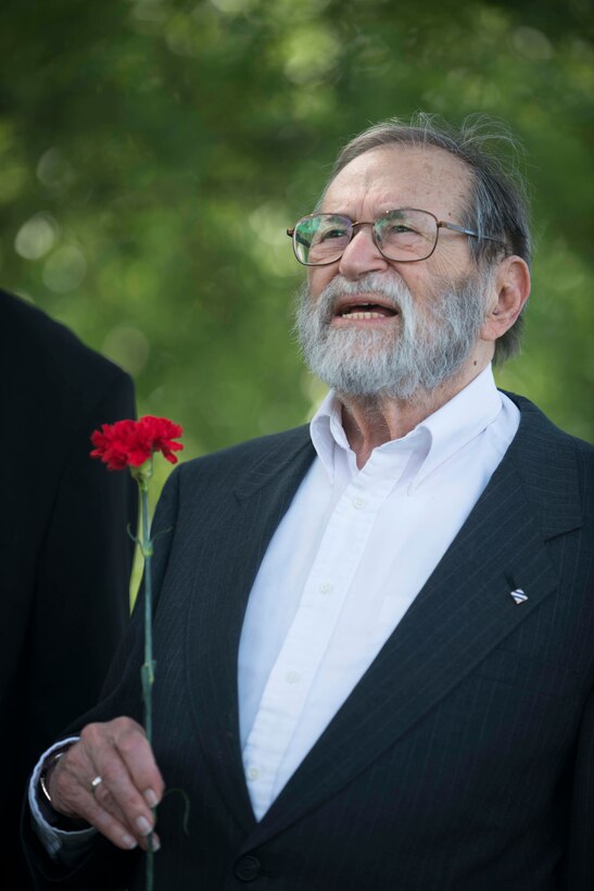 William Weinberg, a World War II veteran who served with the 3rd Infantry Division, speaks about his memories of Audie Murphy at Murphy’s gravesite at Arlington National Cemetery in Arlington, Va., May 28, 2015. Murphy, a Medal of Honor recipient during World War II, was assigned to the 3rd Infantry Division.