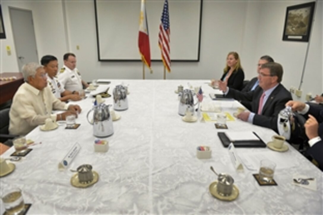 Defense Secretary Ash Carter, right, meets with Philippine Defense Minister Voltaire Gazmin in Honolulu, Hawaii, May 27, 2015. Carter and Gazmin discussed mutual defense interests in the Asia-Pacific and reaffirmed the strong and enduring ties between the two nations.